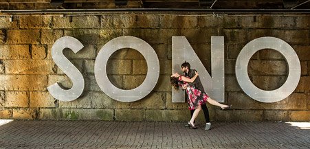 A couple in front of the SONO design